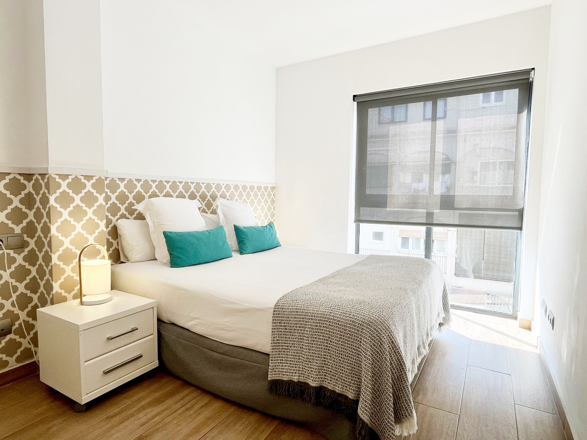 Bright and cozy bedroom in Barcelona